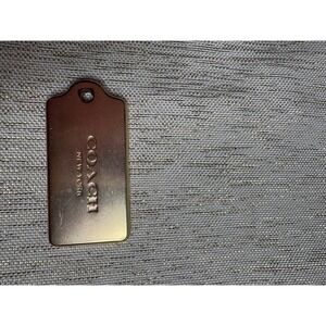 Coach metal keychain